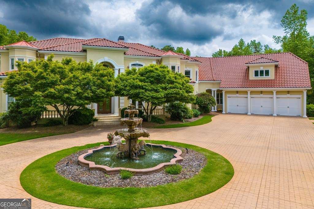 1005 Oak Mountain Road Carrollton, GA 30116 - Photo 57 of 59 a house view with a swimming pool