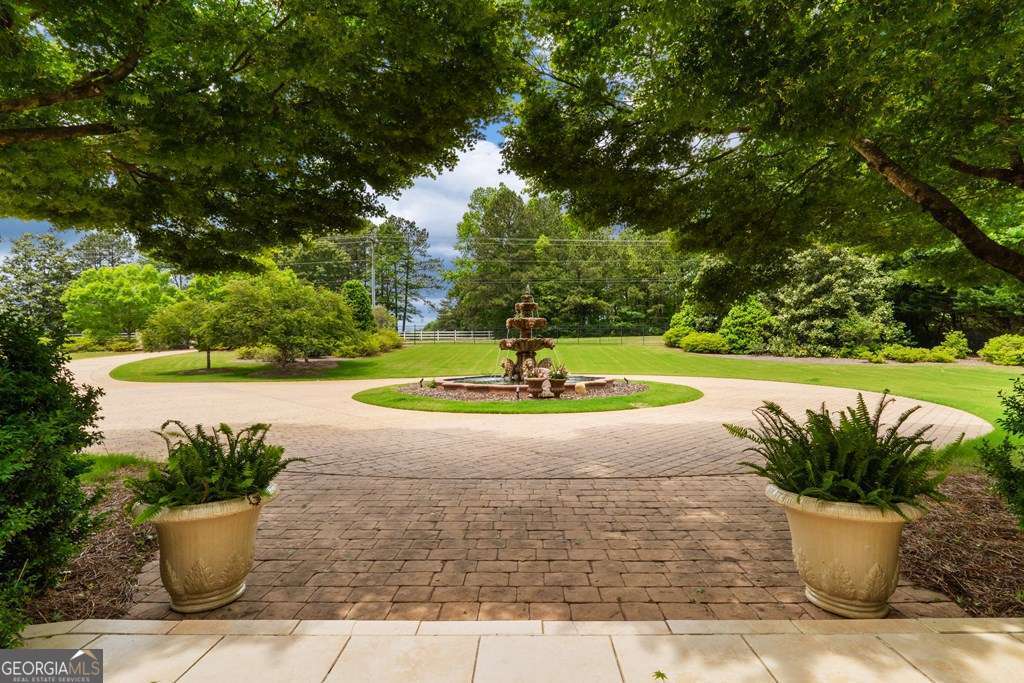 1005 Oak Mountain Road Carrollton, GA 30116 - Photo 7 of 59 a view of a white tub sitting in a yard