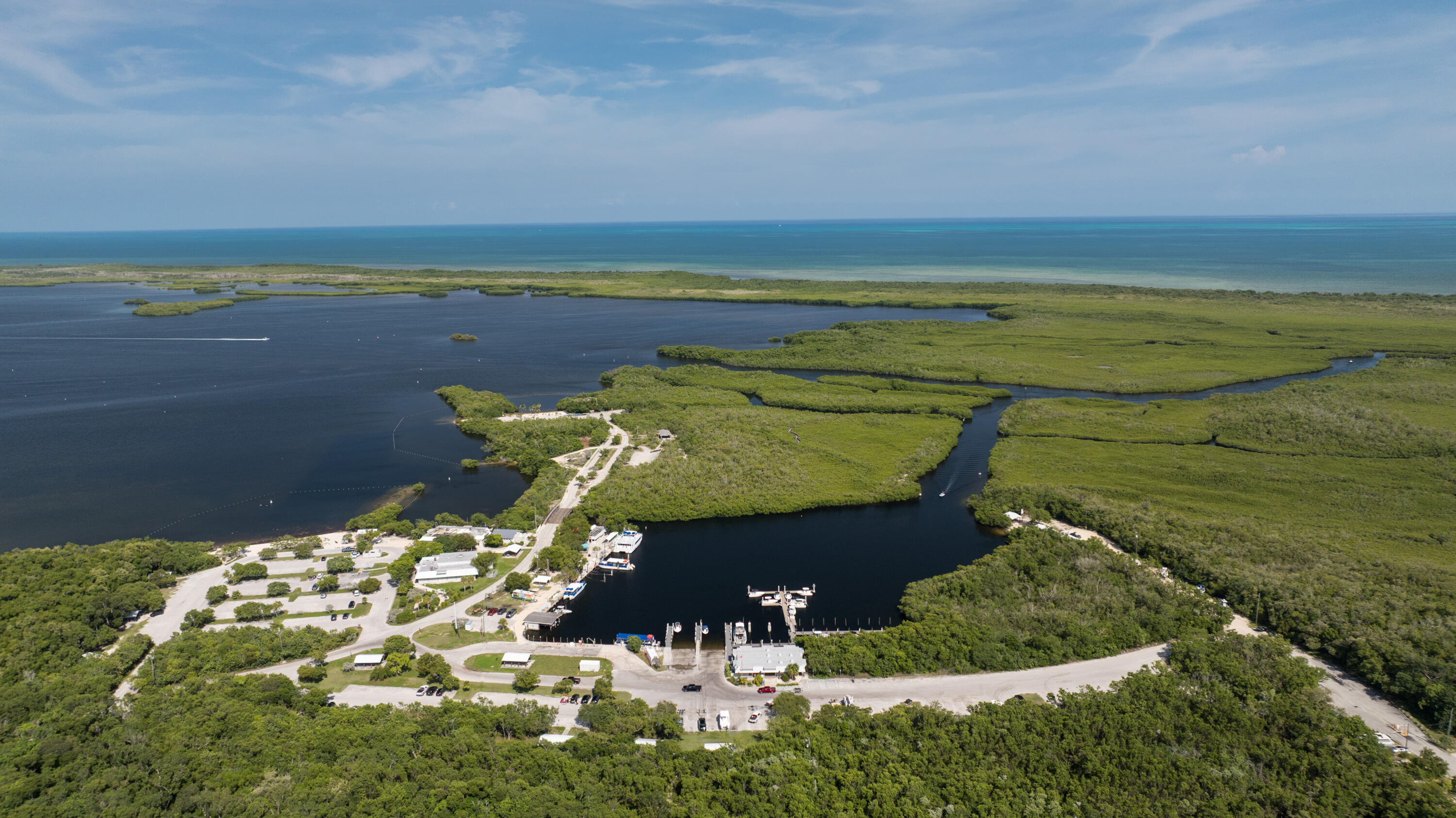 974 Oleander Road Key Largo, FL 33037 - Photo 11 of 15 an aerial view of a house with a lake view