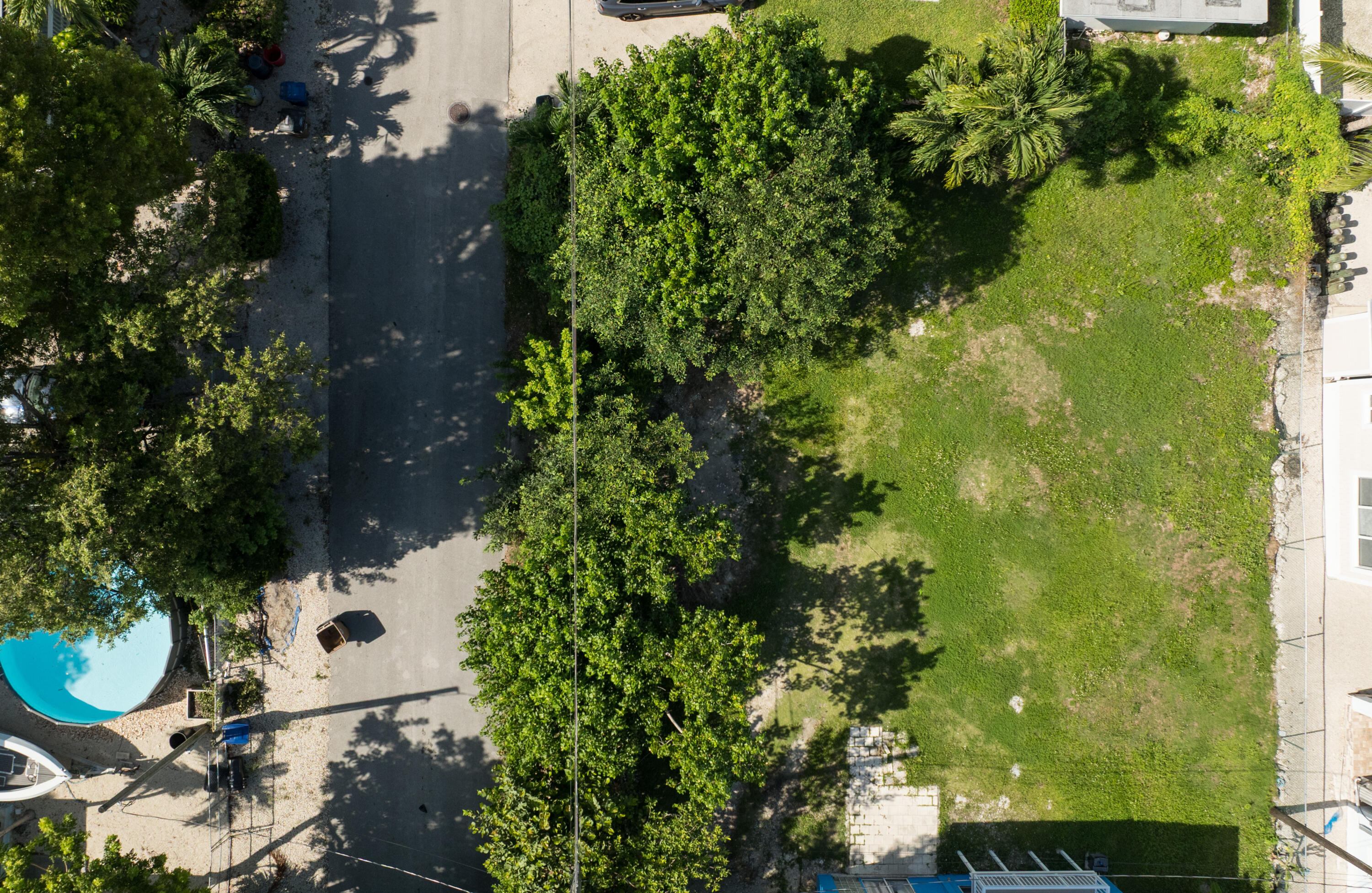 974 Oleander Road Key Largo, FL 33037 - Photo 2 of 15 an aerial view of a residential houses with yard