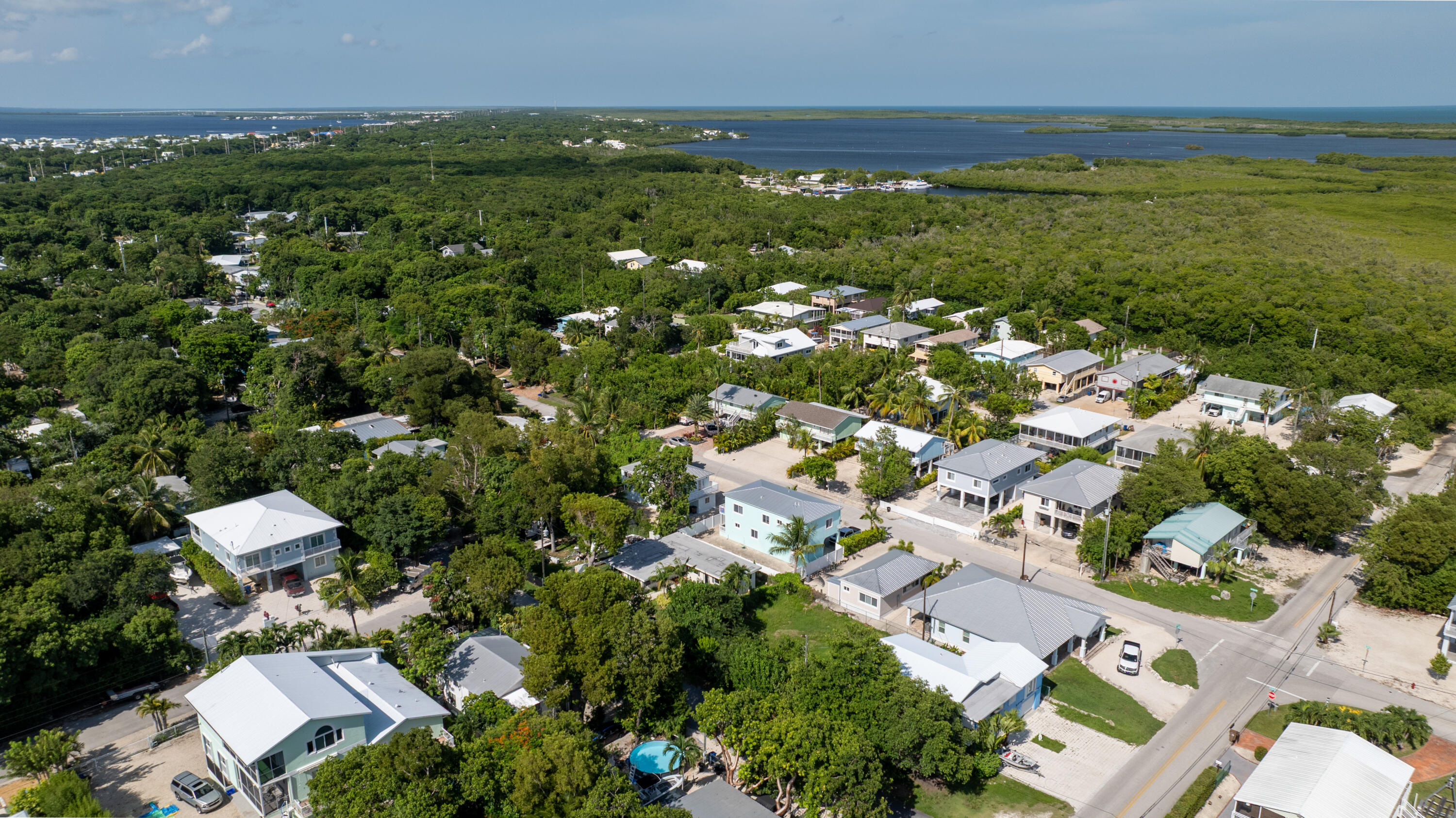 974 Oleander Road Key Largo, FL 33037 - Photo 4 of 15 an aerial view of residential houses with outdoor space and trees