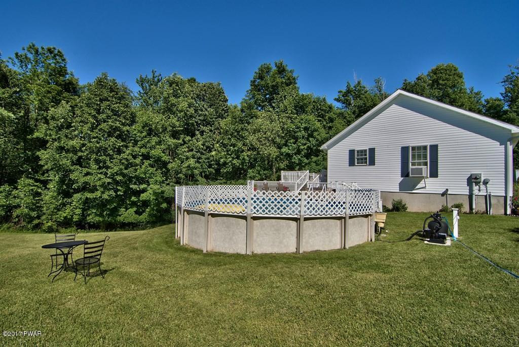 145 Keystone Road Lake Ariel, PA 18436 - Photo 45 of 52 a view of a backyard with a garden and entertaining space