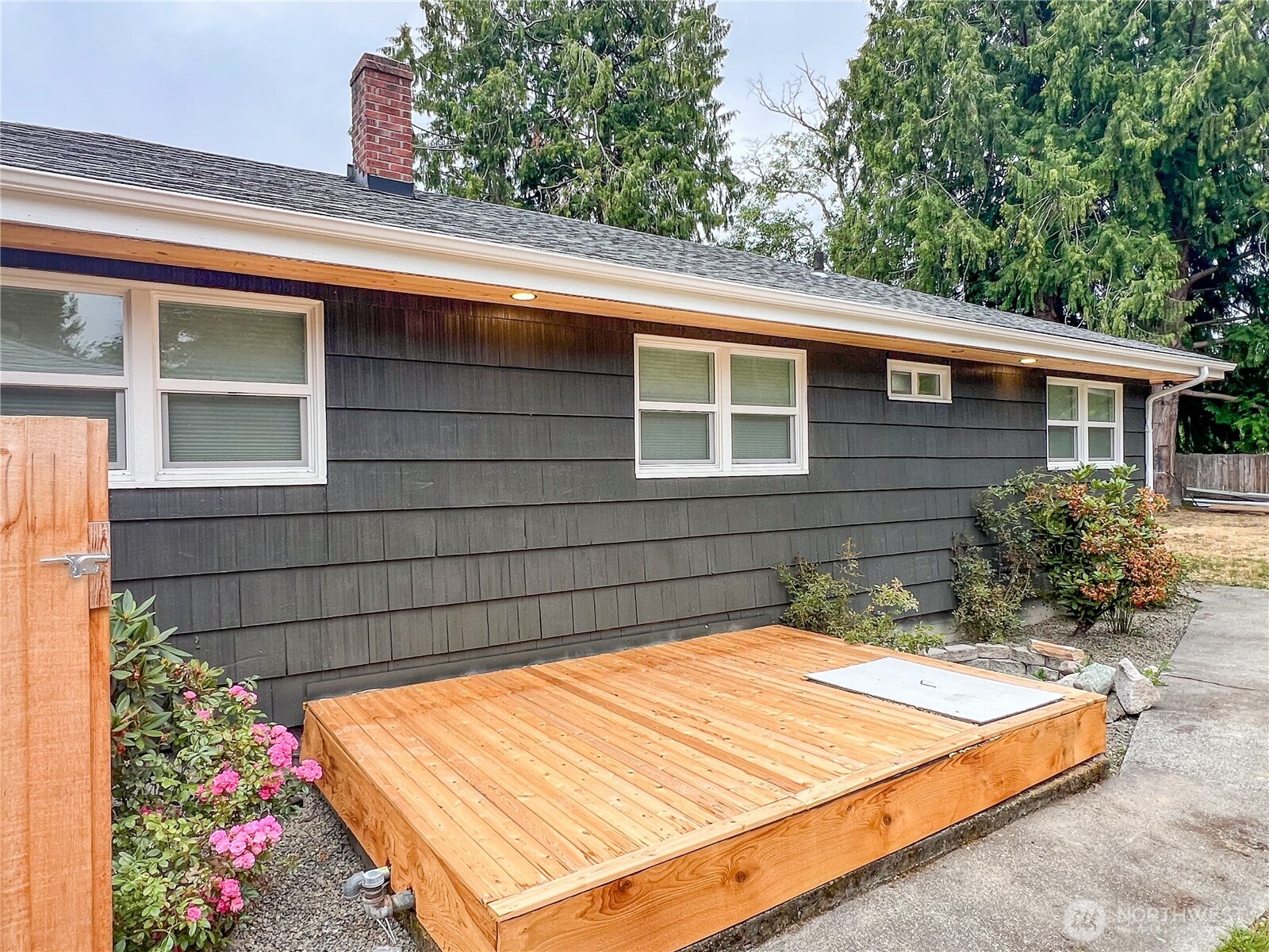 6192 State Rte 20 Port Townsend, WA 98368 - Photo 18 of 25 a view of a backyard with a large tree