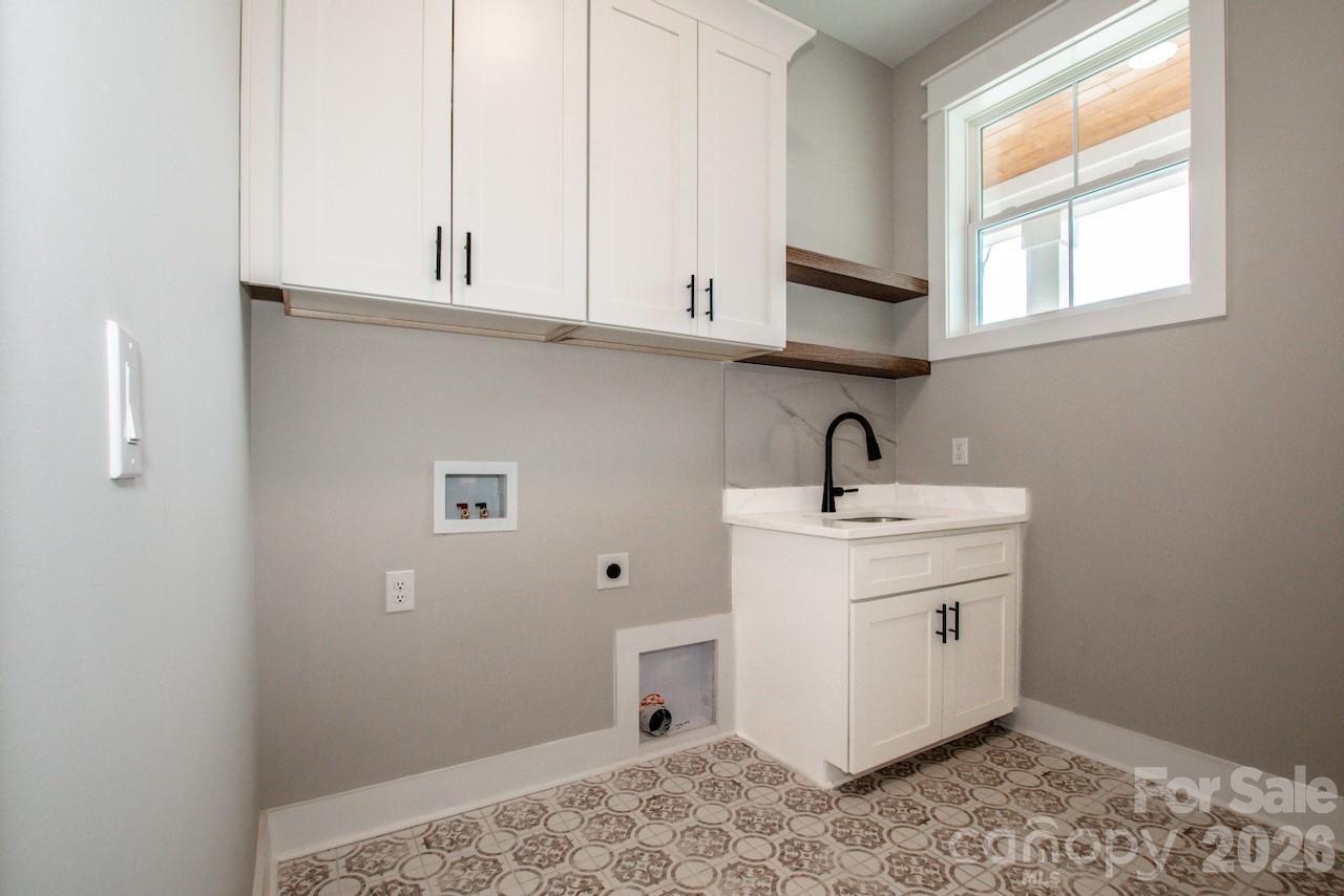 4453 Brancer Lane, Unit 4 Lincolnton, NC 28092 - Photo 18 of 48 a bathroom with a sink and a window