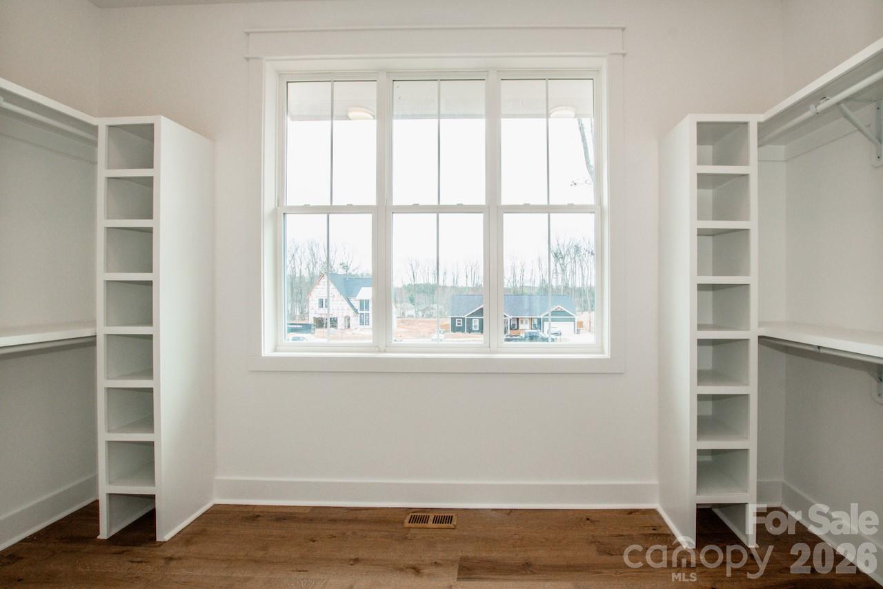 4453 Brancer Lane, Unit 4 Lincolnton, NC 28092 - Photo 26 of 48 a view of an empty room with wooden floor and a window