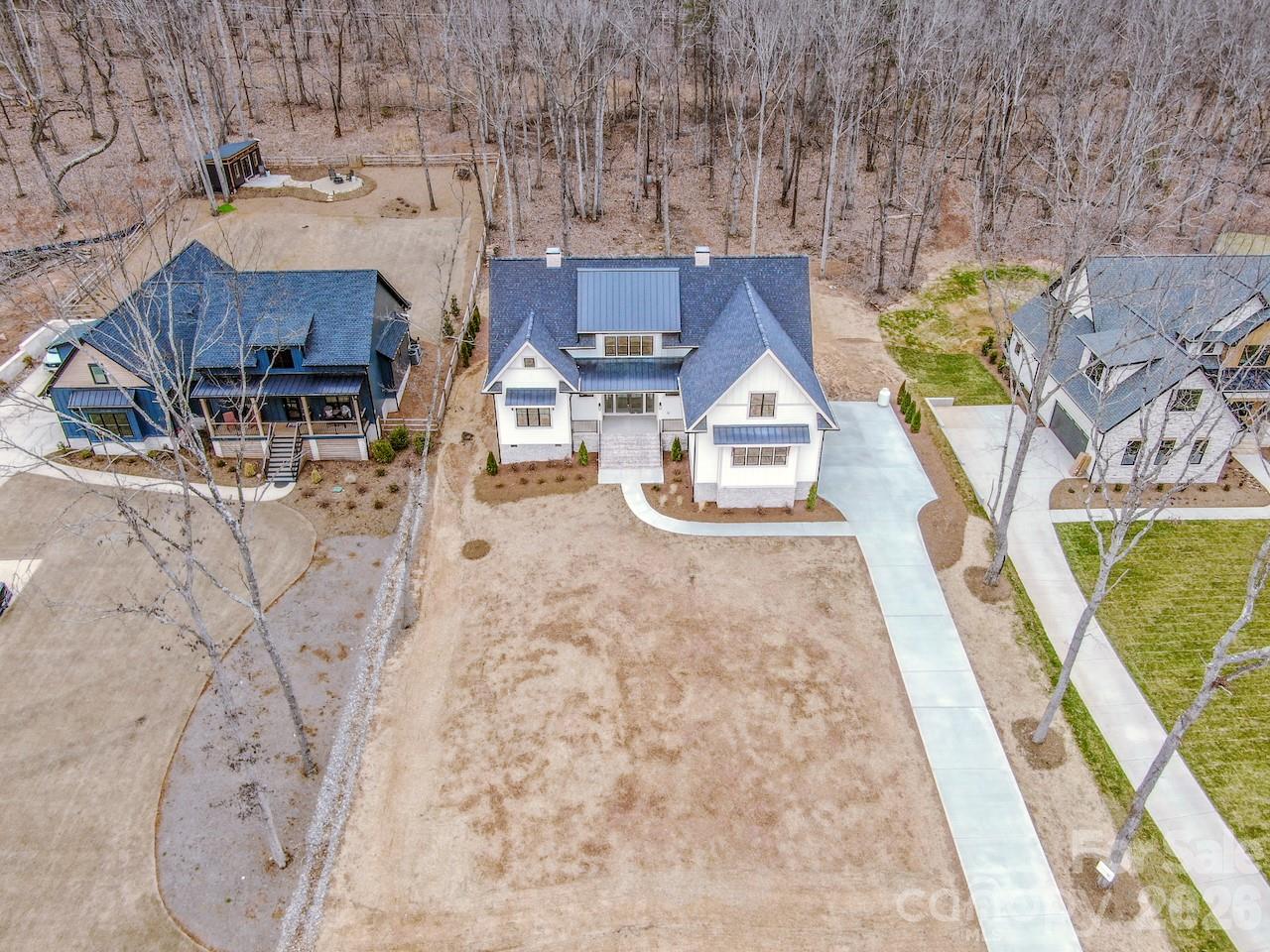 4453 Brancer Lane, Unit 4 Lincolnton, NC 28092 - Photo 3 of 48 an aerial view of residential houses with outdoor space