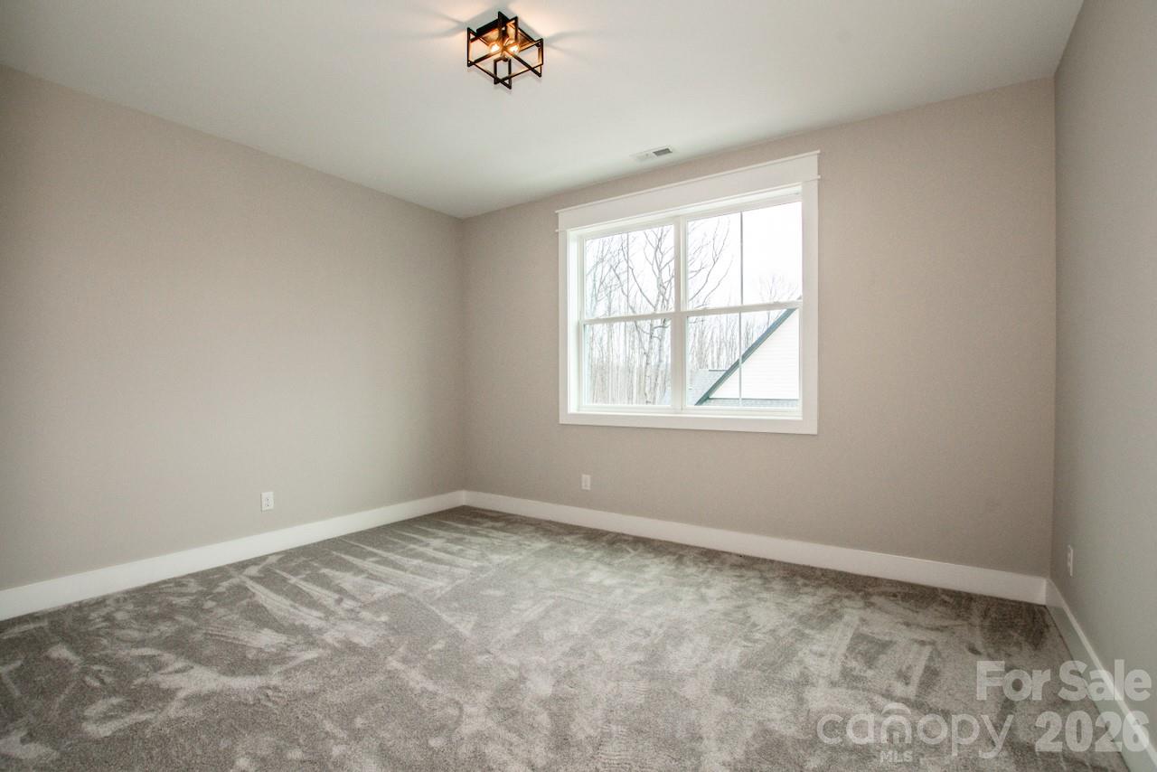 4453 Brancer Lane, Unit 4 Lincolnton, NC 28092 - Photo 38 of 48 an empty room with a window