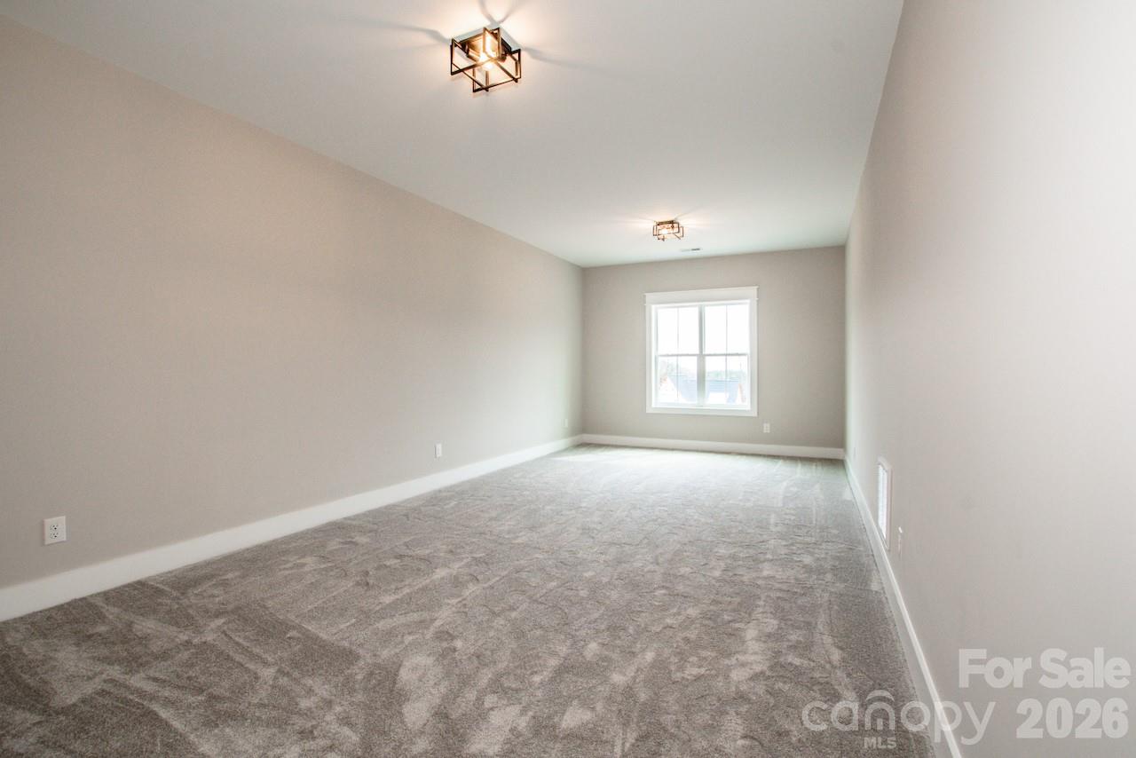 4453 Brancer Lane, Unit 4 Lincolnton, NC 28092 - Photo 42 of 48 an empty room with a window