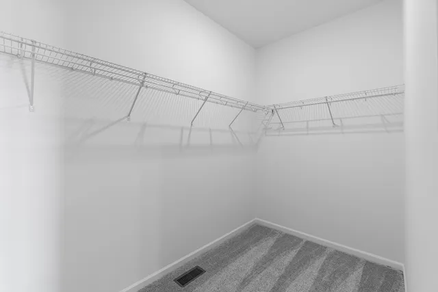 a view of a room with racks on the wall