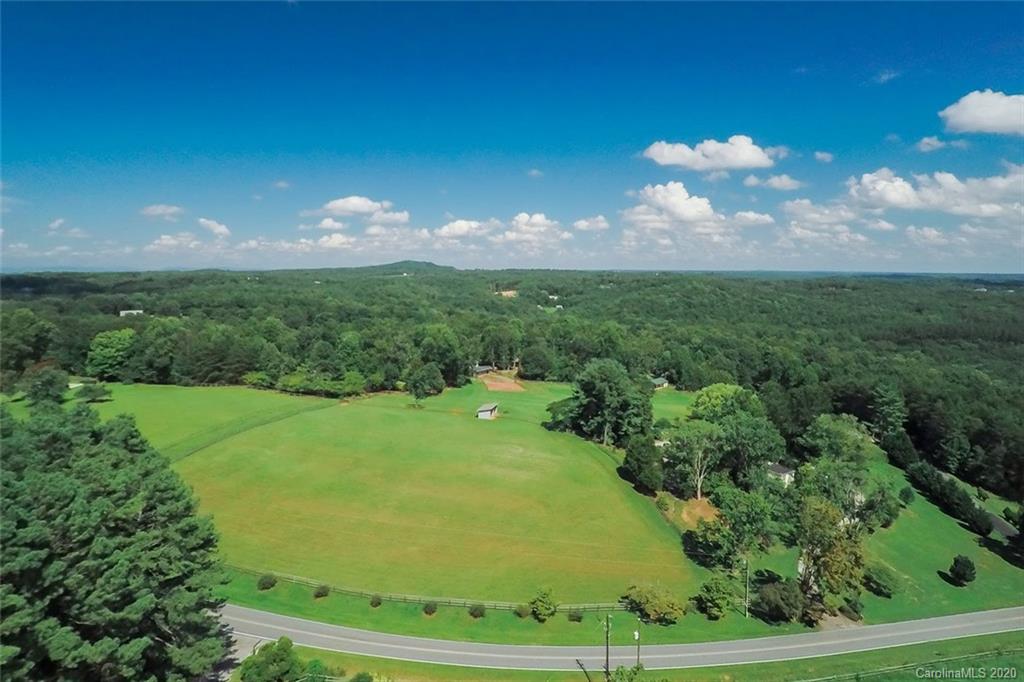 14 Holly Ridge Lane Tryon, NC 28782 - Photo 2 of 42 a view of a big yard with large trees