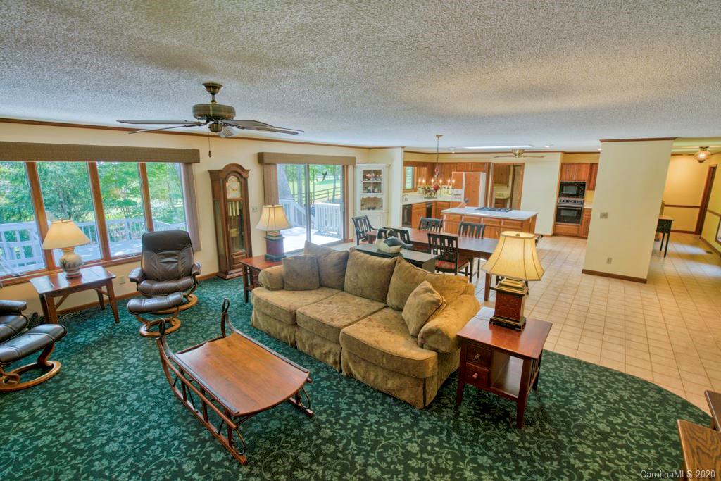 14 Holly Ridge Lane Tryon, NC 28782 - Photo 17 of 42 a living room with furniture and a large window