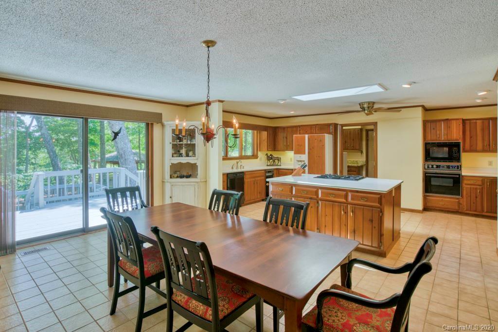 14 Holly Ridge Lane Tryon, NC 28782 - Photo 18 of 42 a view of a dining room with furniture window and outside view