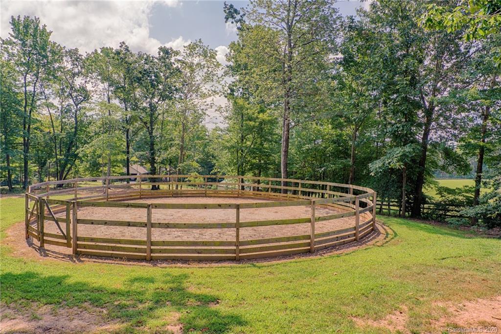 14 Holly Ridge Lane Tryon, NC 28782 - Photo 40 of 42 a view of swimming pool with a bench in a park