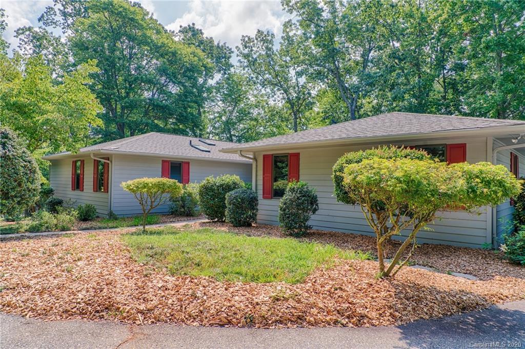 14 Holly Ridge Lane Tryon, NC 28782 - Photo 7 of 42 a front view of a house with garden
