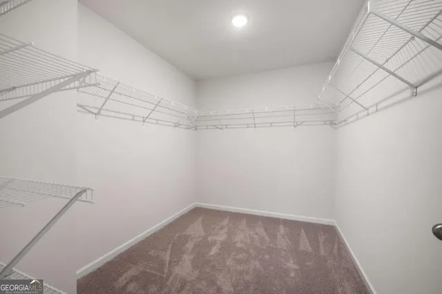 a view of a room with racks on the wall