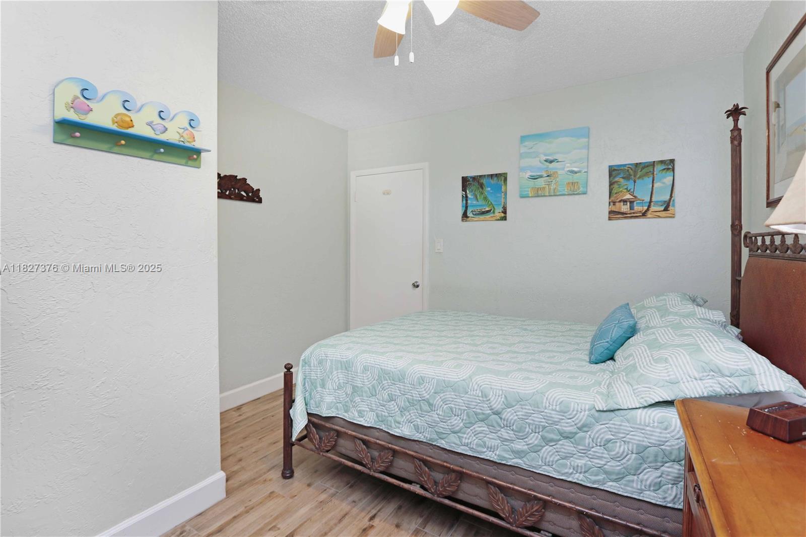 3300 North Surf Road, Unit 3A Hollywood, FL 33019 - Photo 19 of 39 a bedroom with a bed and a window