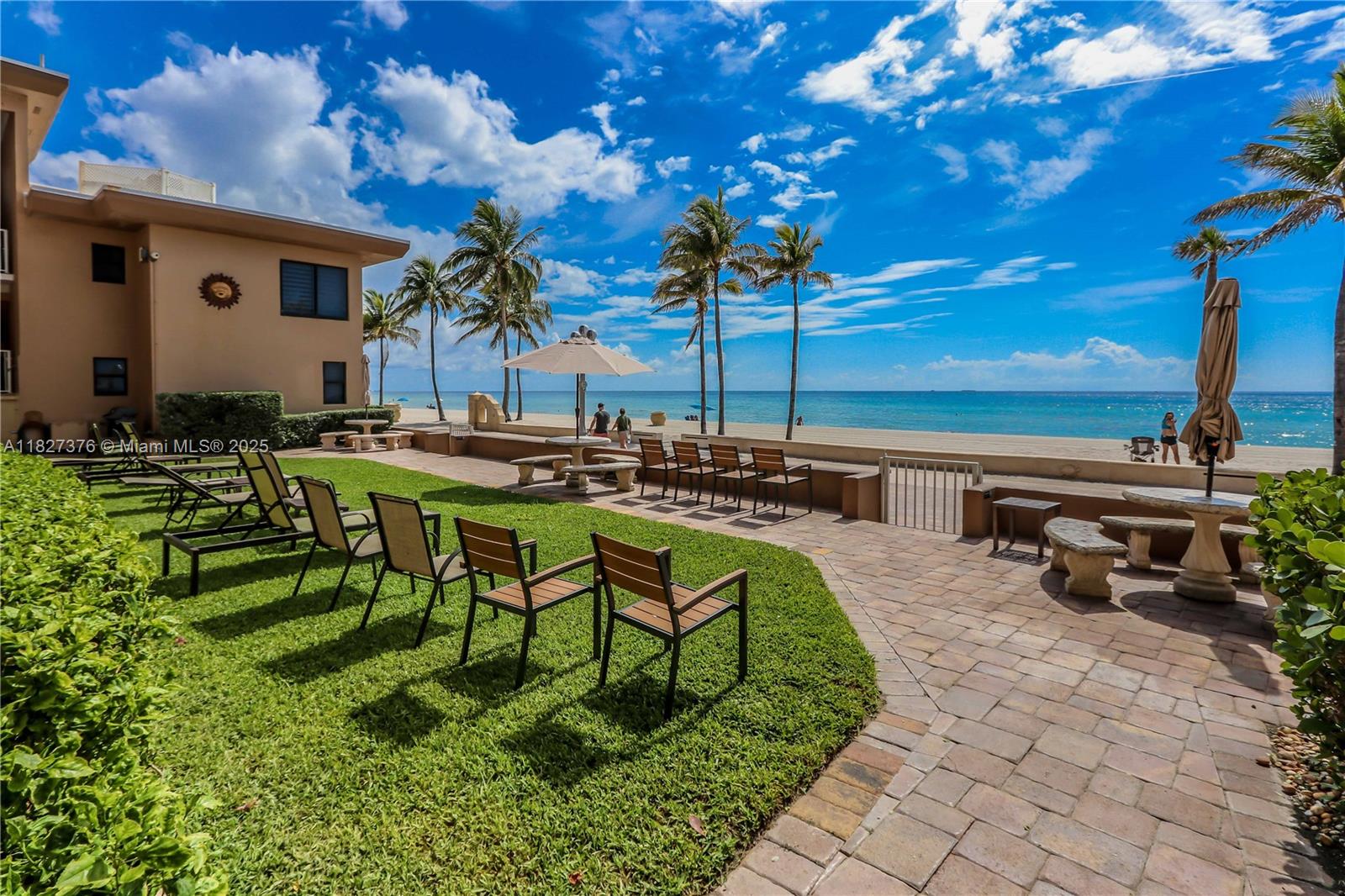 3300 North Surf Road, Unit 3A Hollywood, FL 33019 - Photo 2 of 39 a view of swimming pool with outdoor seating and plants