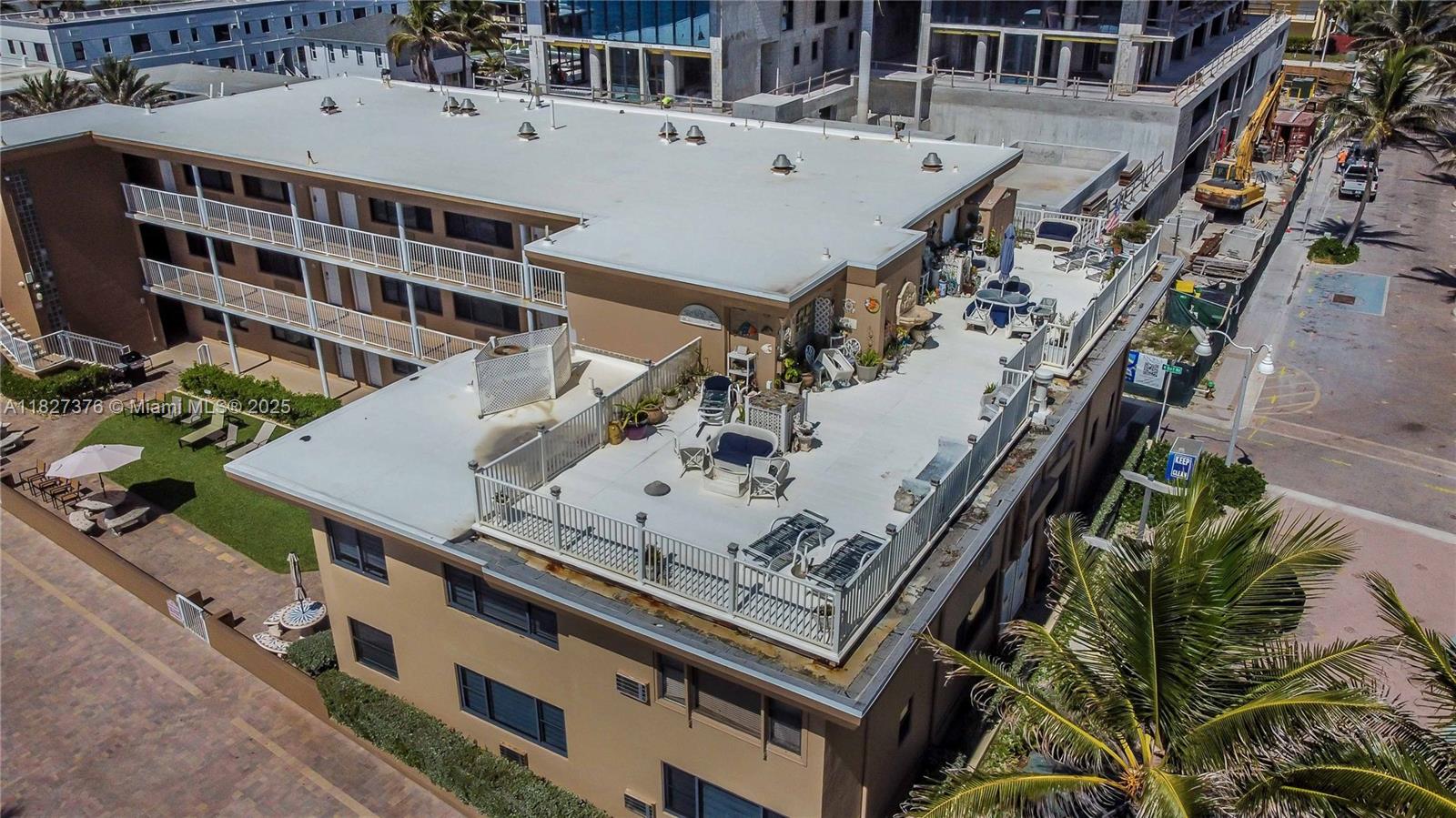 3300 North Surf Road, Unit 3A Hollywood, FL 33019 - Photo 25 of 39 a aerial view of a balcony with table and chairs