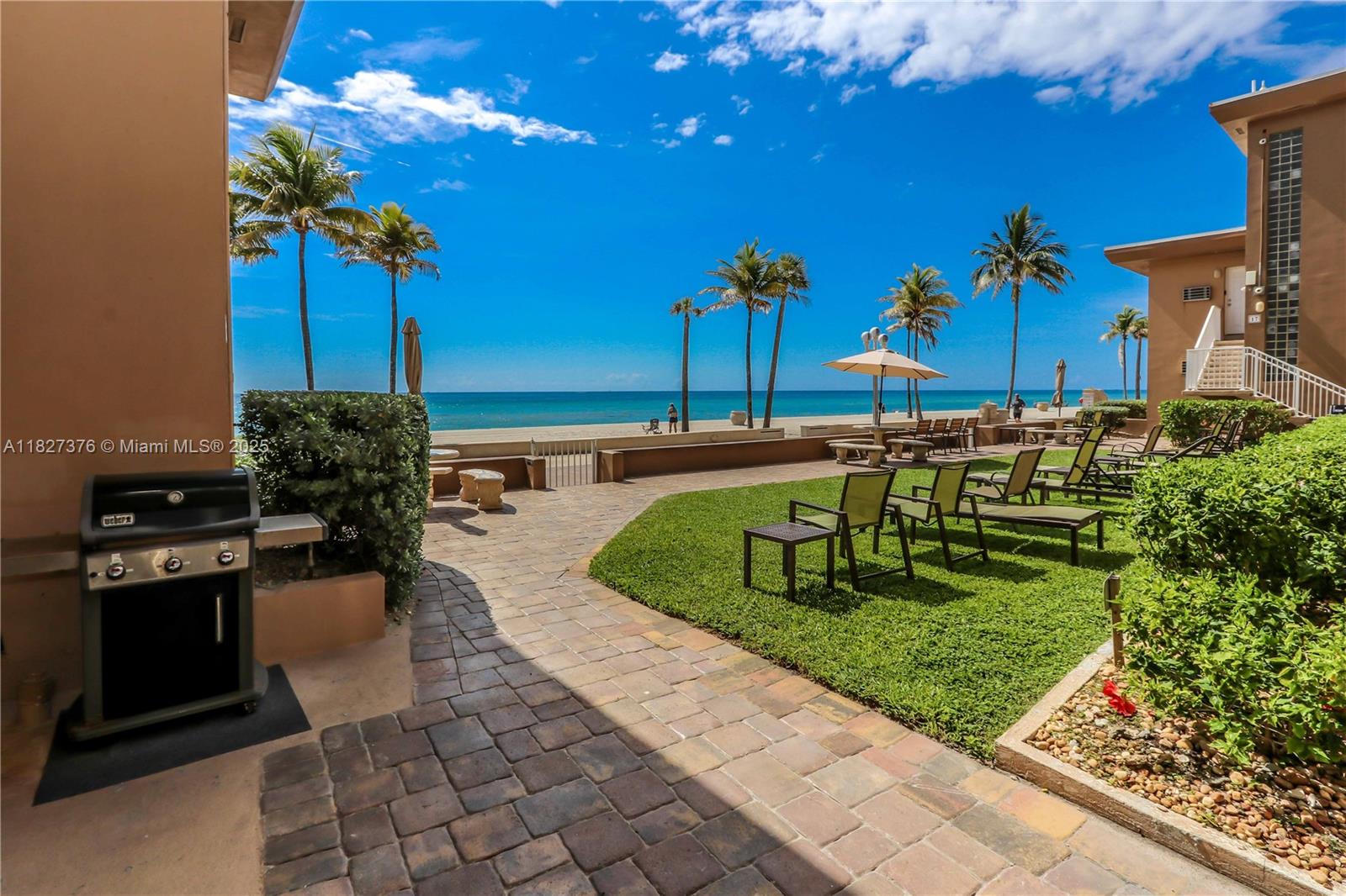 3300 North Surf Road, Unit 3A Hollywood, FL 33019 - Photo 33 of 39 a view of a swimming pool with a patio