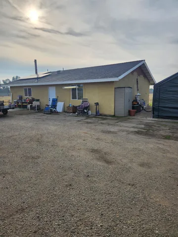 a view of a house with a patio