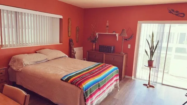 a view of front door with wooden floor