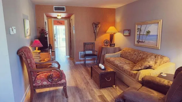 a living room with furniture and a couch