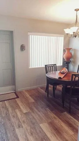 a view of kitchen with furniture and stove