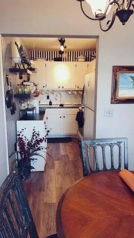 a kitchen with a stove and a sink