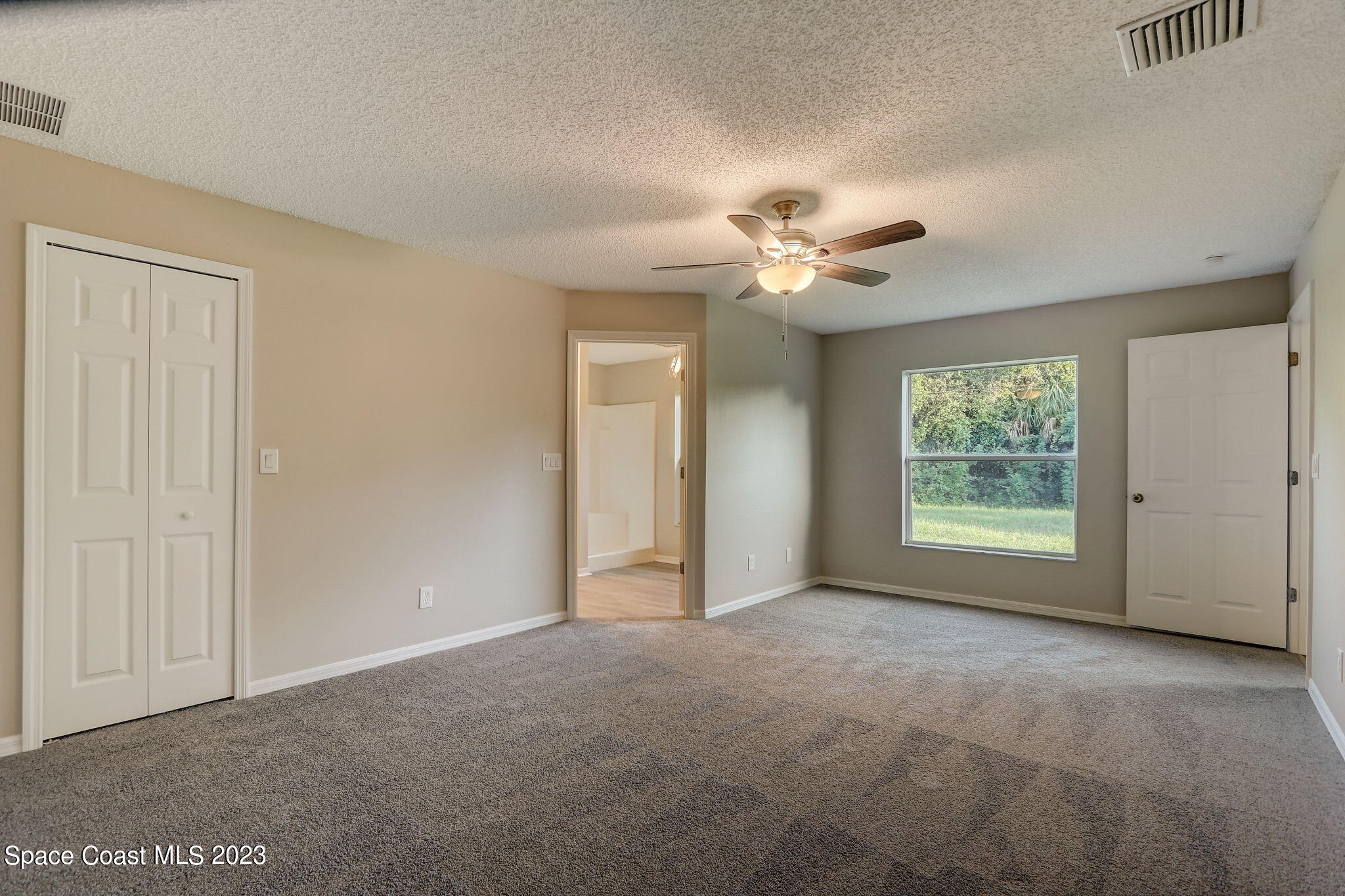 280 Gamewell Road Southwest Palm Bay, FL 32908 - Photo 15 of 19 a view of an empty room with a window