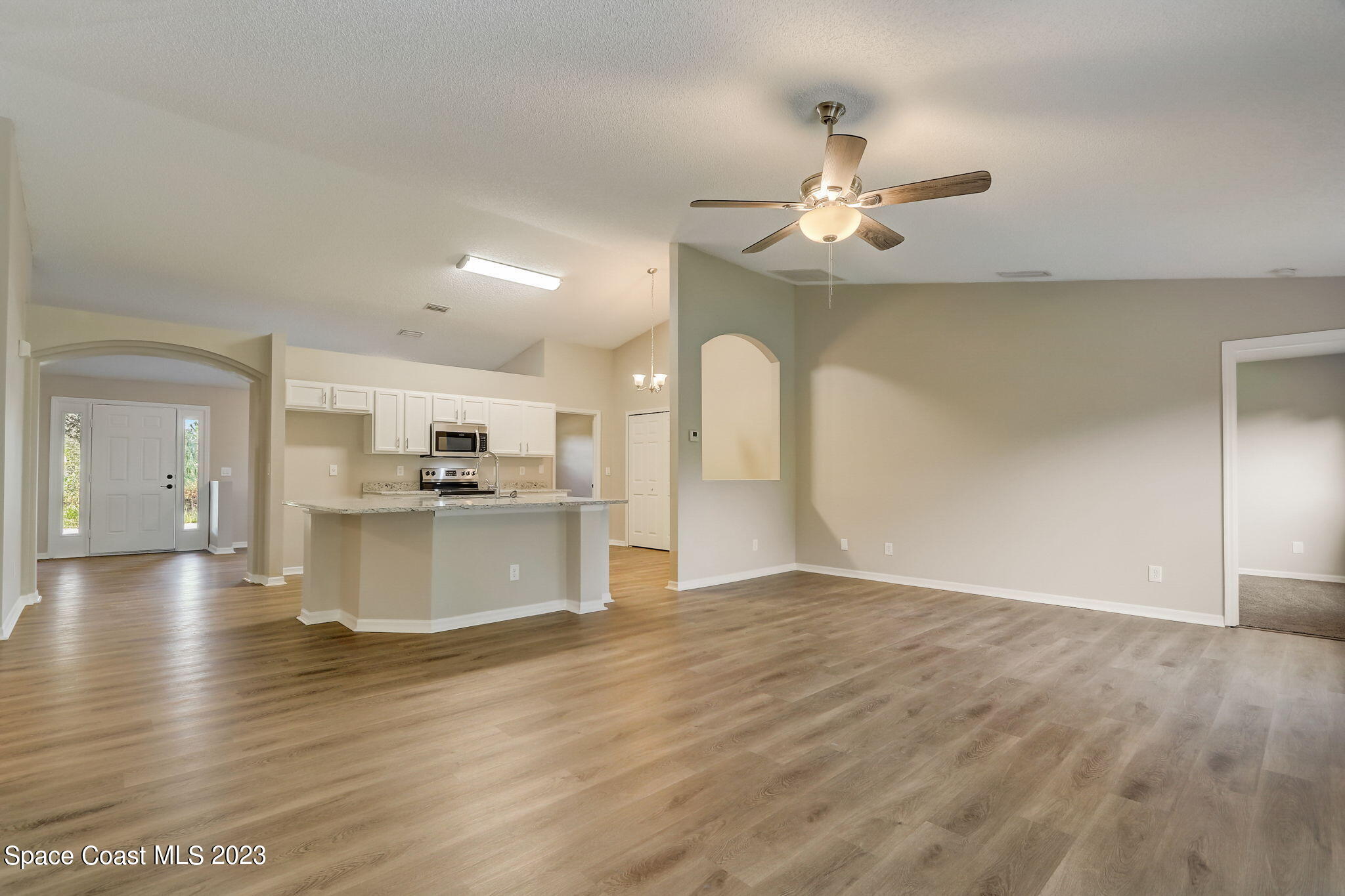 280 Gamewell Road Southwest Palm Bay, FL 32908 - Photo 3 of 19 a view of a kitchen with a sink and a window
