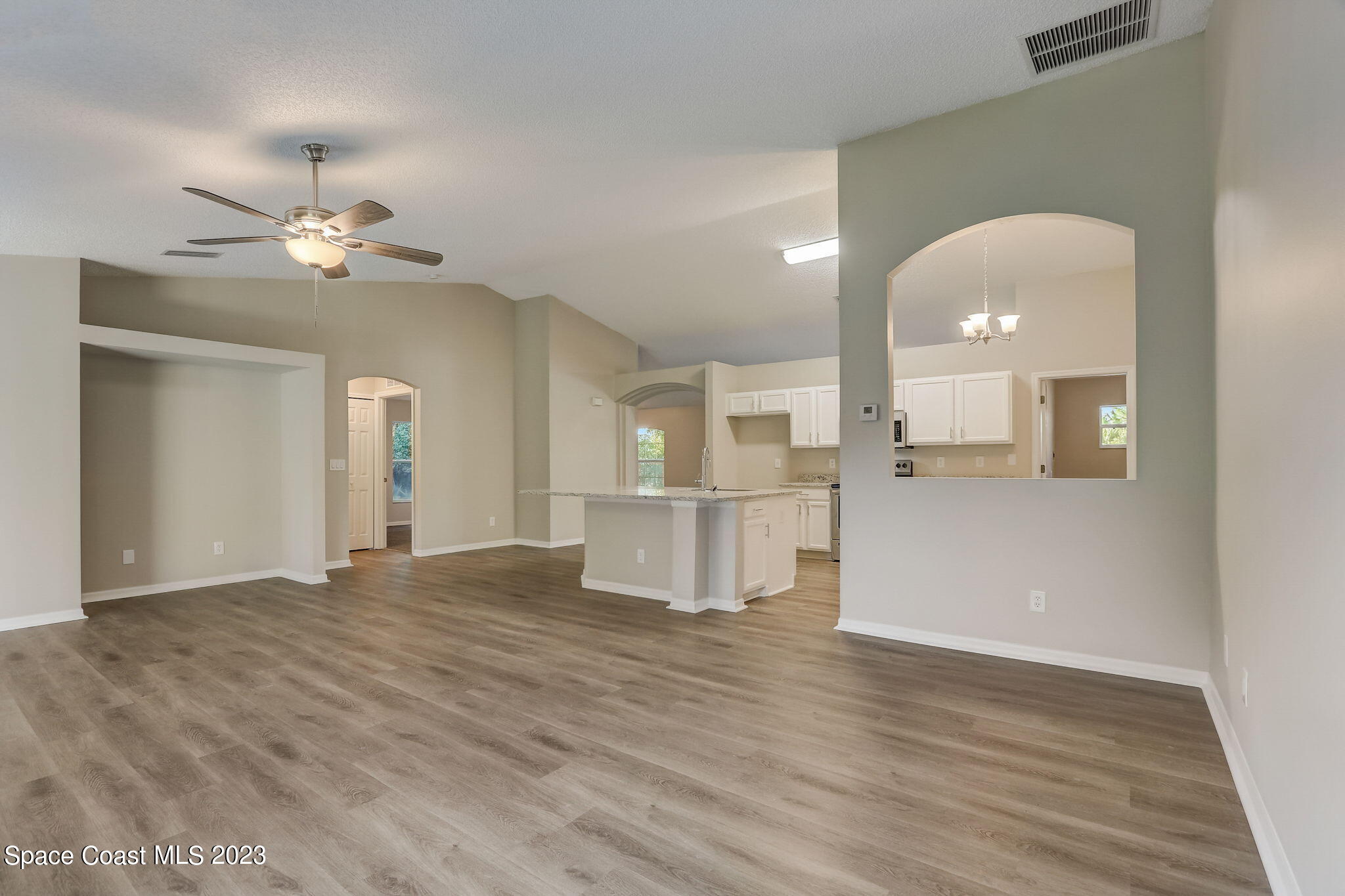 280 Gamewell Road Southwest Palm Bay, FL 32908 - Photo 4 of 19 a view of an empty room and kitchen view