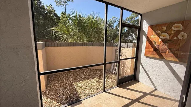 a view of balcony with a potted plant