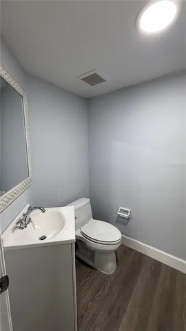 a bathroom with a sink and a toilet