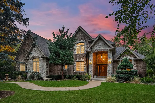 front view of a house with a yard