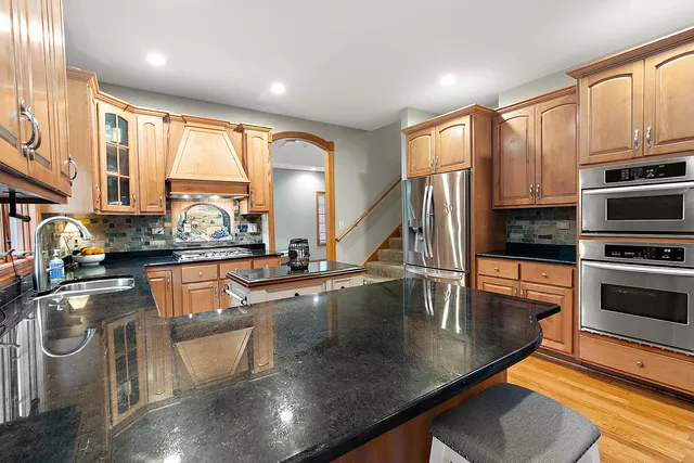 a kitchen with a stove and cabinets