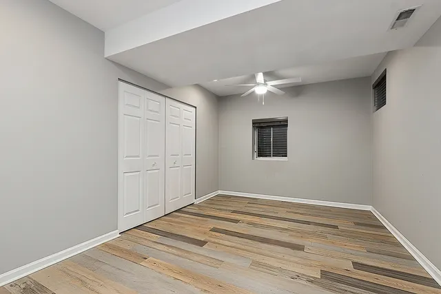 a front view of house with yard and outdoor seating