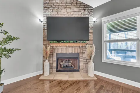 a living room with a fireplace