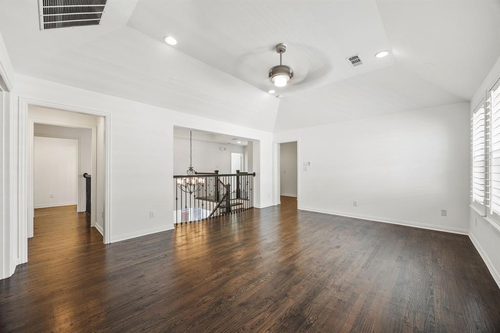 3040 Dunverny The Colony, TX 75056 - Photo 23 of 40 a view of an empty room with wooden floor and a window