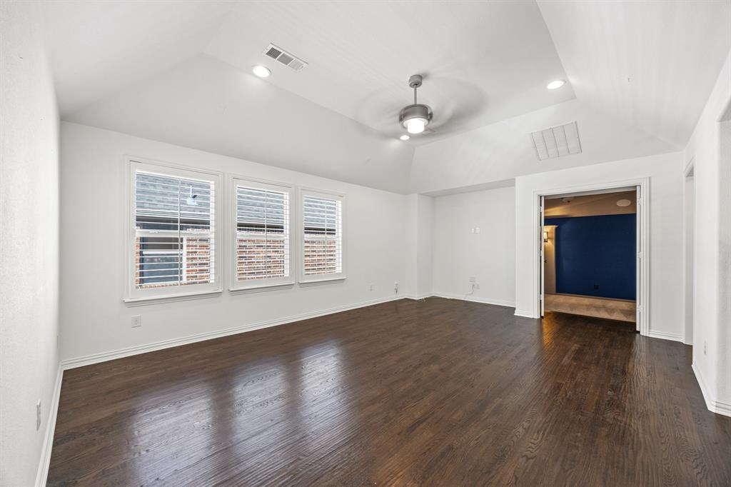 3040 Dunverny The Colony, TX 75056 - Photo 26 of 40 a view of an empty room with wooden floor and a window