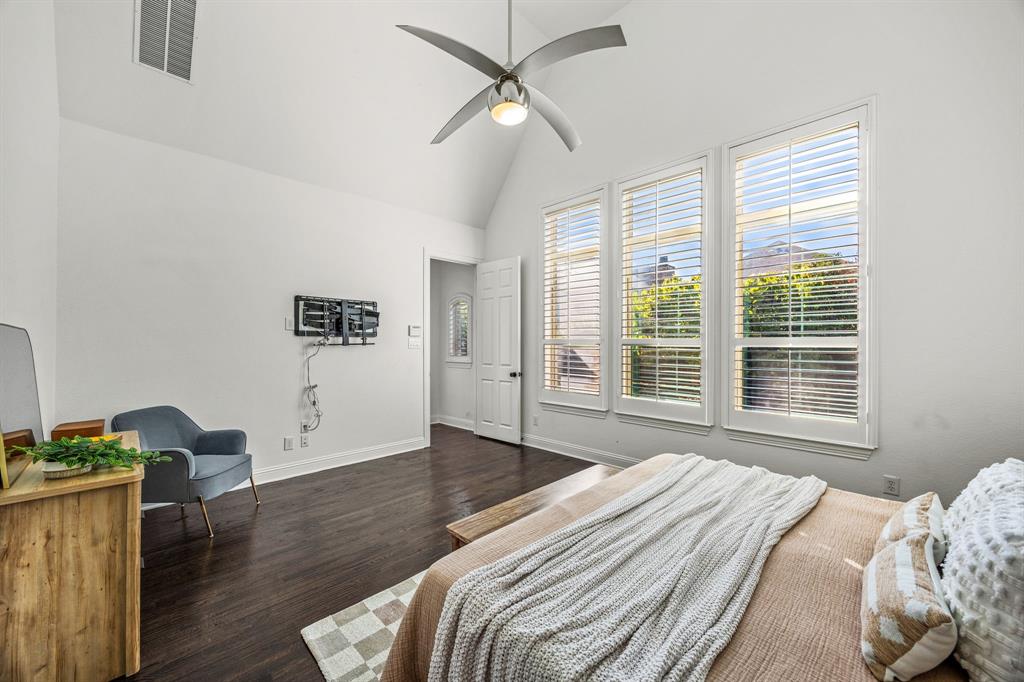 3040 Dunverny The Colony, TX 75056 - Photo 28 of 40 a bedroom with a bed wooden floor and window