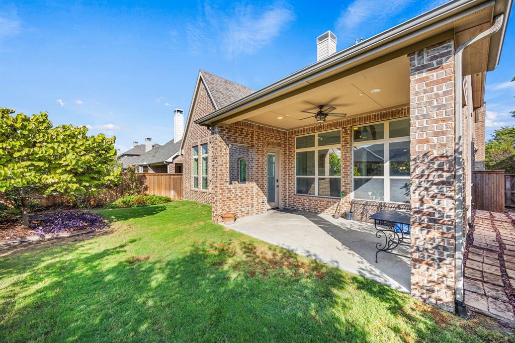 3040 Dunverny The Colony, TX 75056 - Photo 34 of 40 a front view of a house with yard and seating area