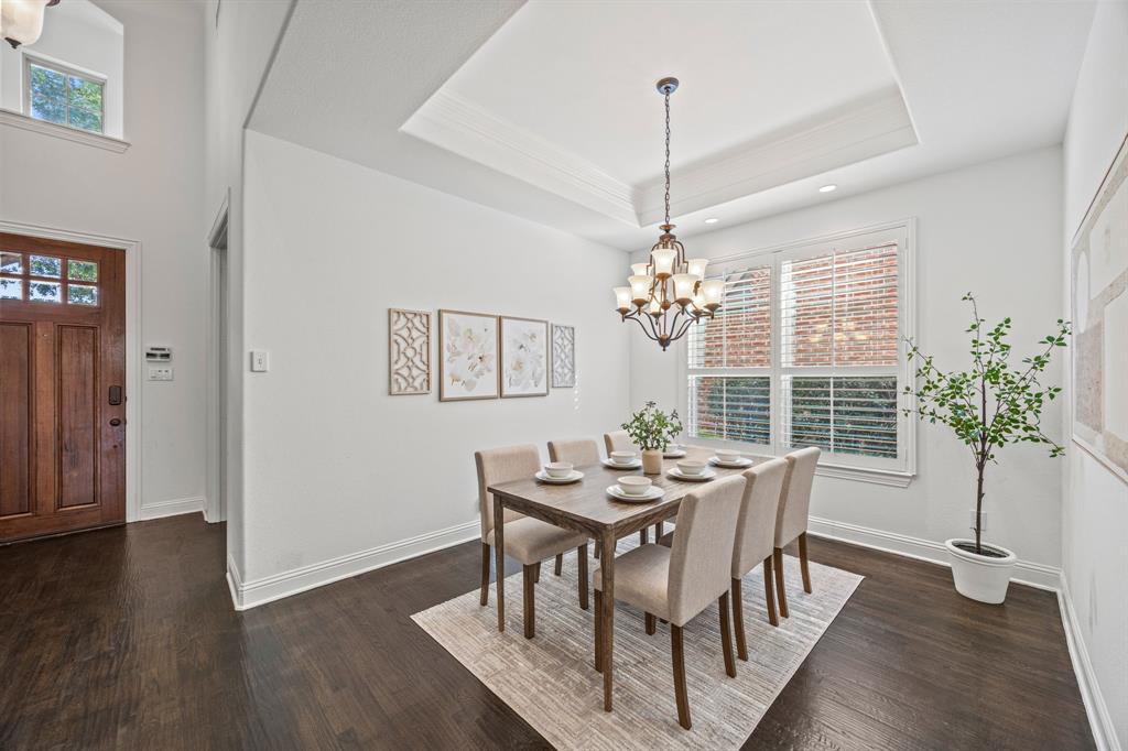 3040 Dunverny The Colony, TX 75056 - Photo 6 of 40 a view of a dining room with furniture window and wooden floor