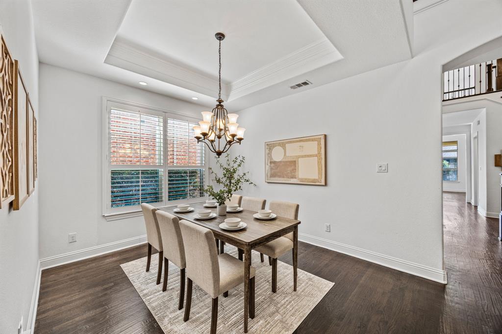3040 Dunverny The Colony, TX 75056 - Photo 7 of 40 a view of a dining room with furniture window and wooden floor