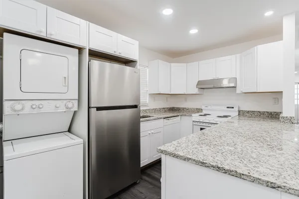 a view of kitchen island with wooden floor