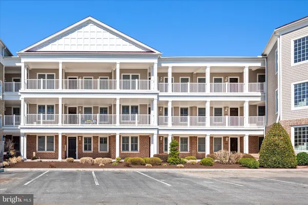 a front view of a building with a street