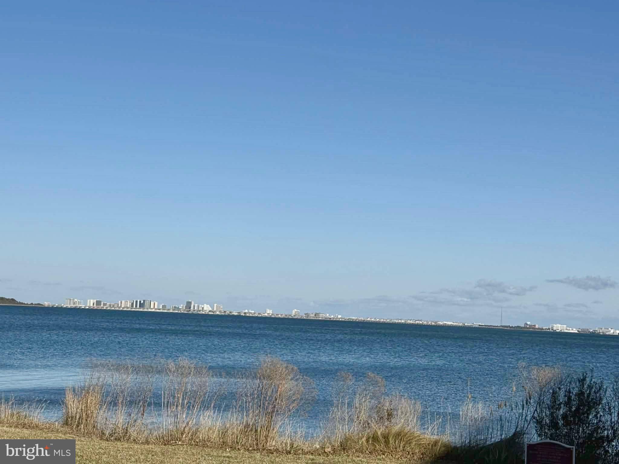 2102 Points Reach, Unit 2102 Berlin, MD 21811 - Photo 5 of 36 a view of lake and mountain