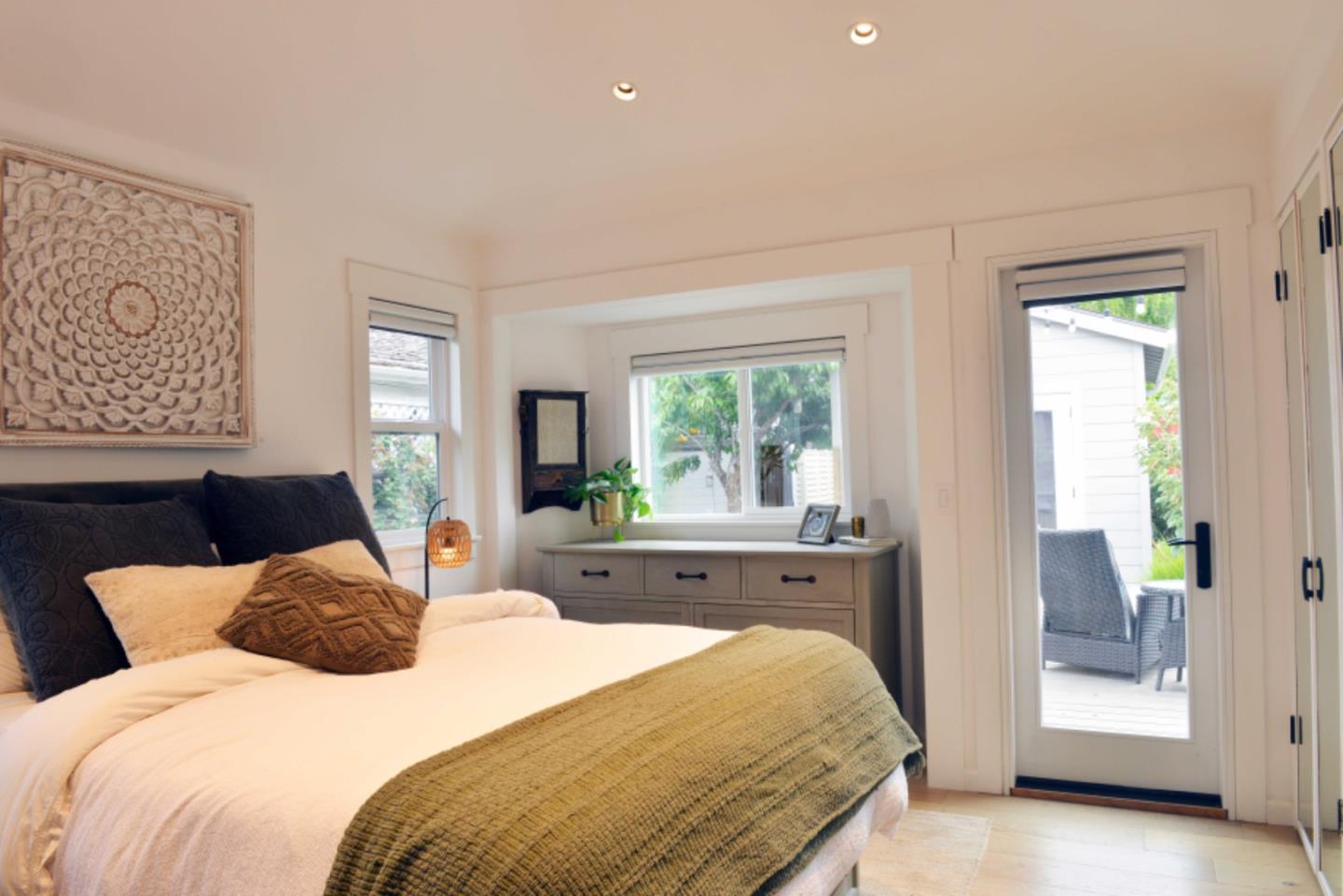 3308 Sycamore Place Carmel, CA 93923 - Photo 9 of 14 a bedroom with a large bed and a window