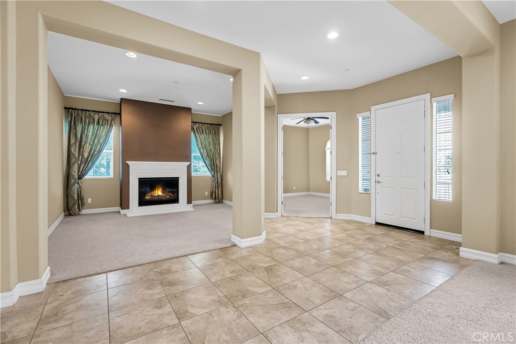 7780 Solitude Court Riverside, CA 92506 - Photo 16 of 63 a view of an empty room and fire place