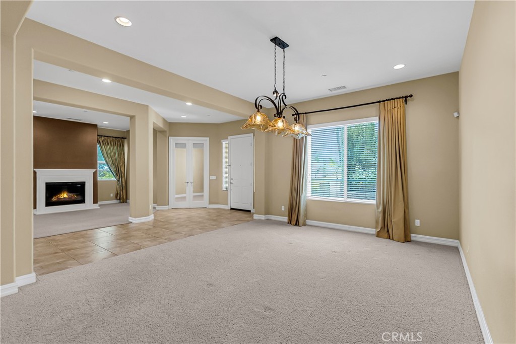 7780 Solitude Court Riverside, CA 92506 - Photo 19 of 63 a view of an empty room with a window