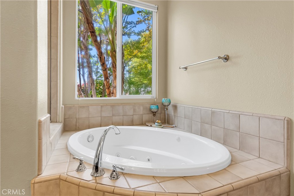 7780 Solitude Court Riverside, CA 92506 - Photo 33 of 63 a bathroom with a sink and a window